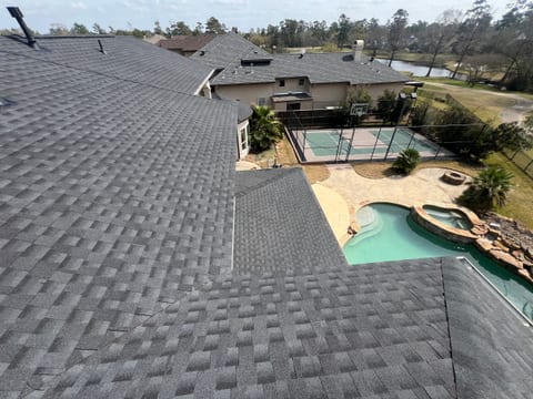 Aerial view of a completed Silverback Roofing roof on a Houston-area home